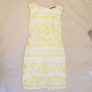 Fully-lined yellow and white lace sheath dress